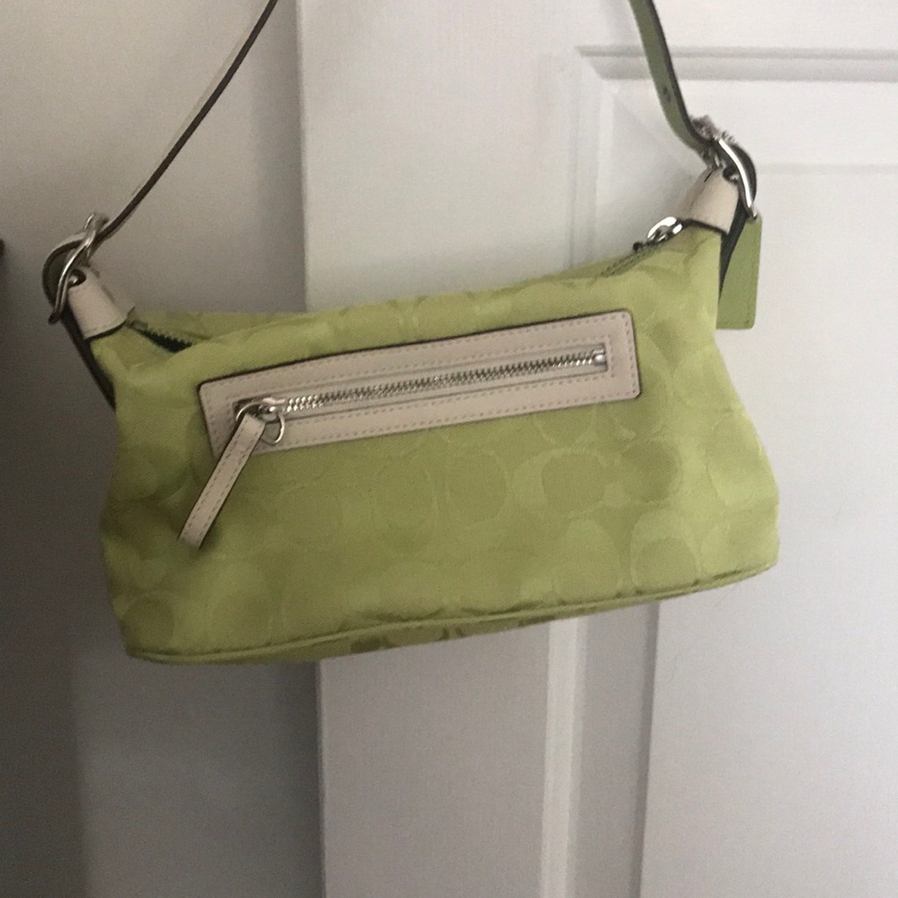 Small green coach purse